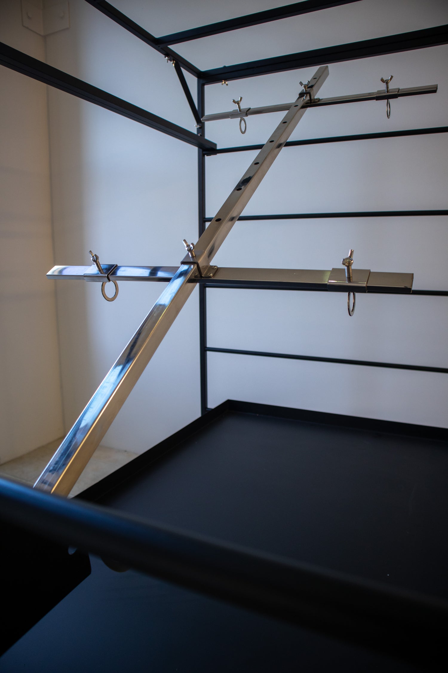 Asado Cross metal cooking frame close-up of construction and durability