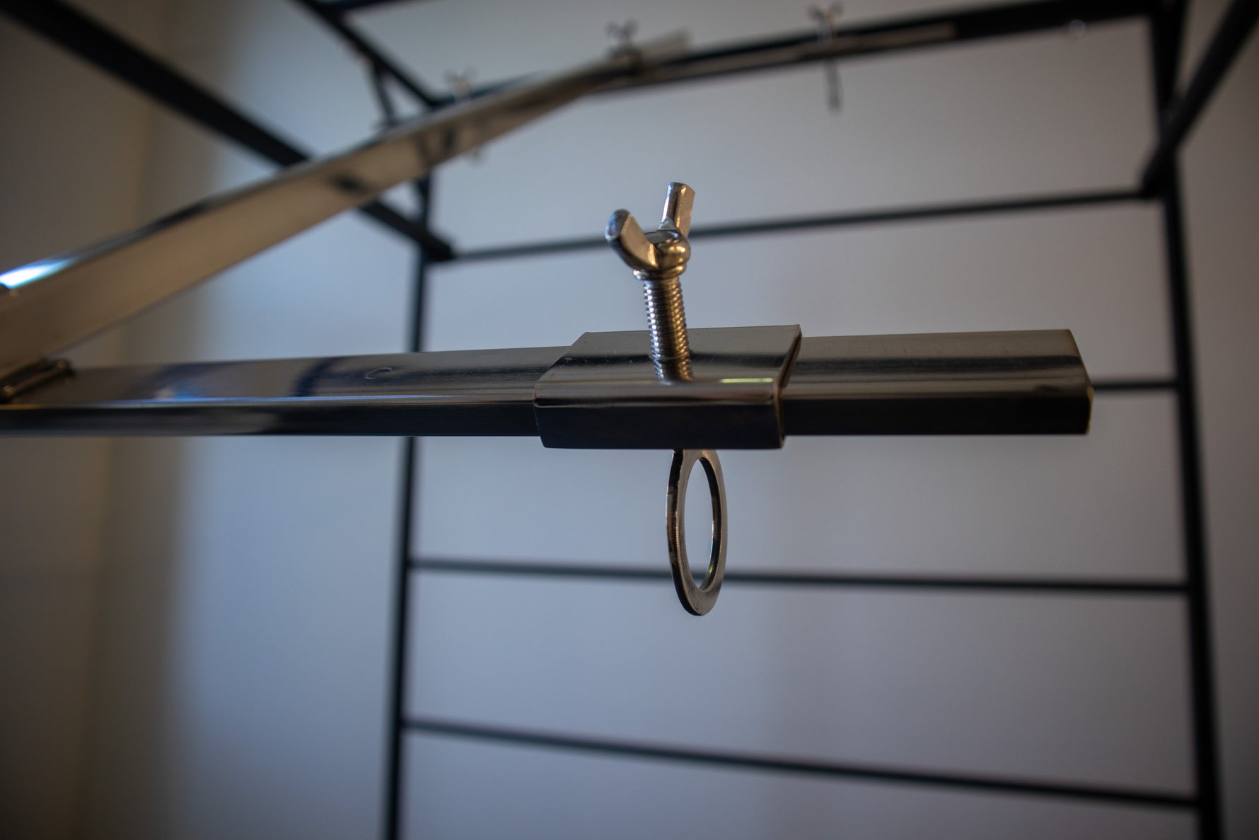 Asado Cross cooking accessory detail showing versatile positioning options