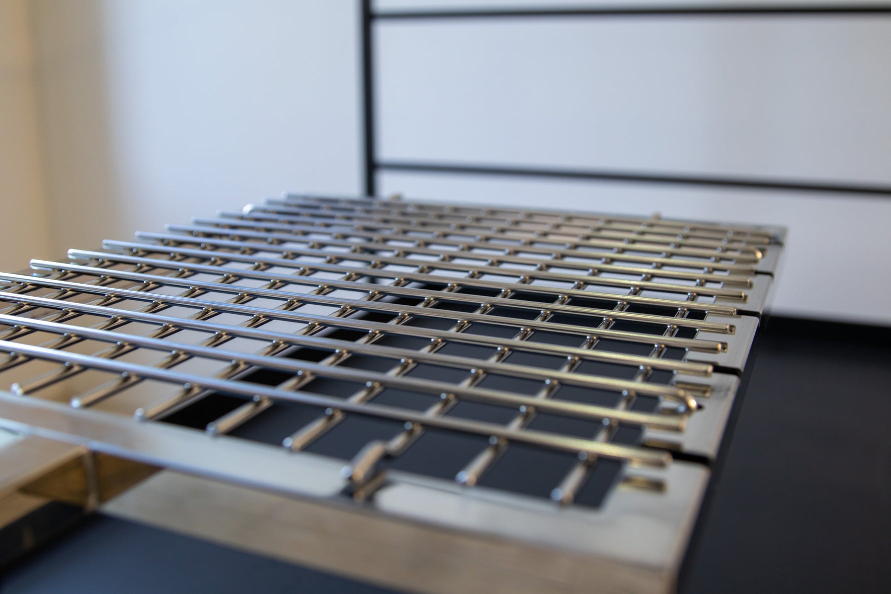 Churrasco grill frame showing skewer positioning for authentic Brazilian cooking