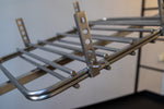 The Press attachment system for Terra Grills open fire BBQ