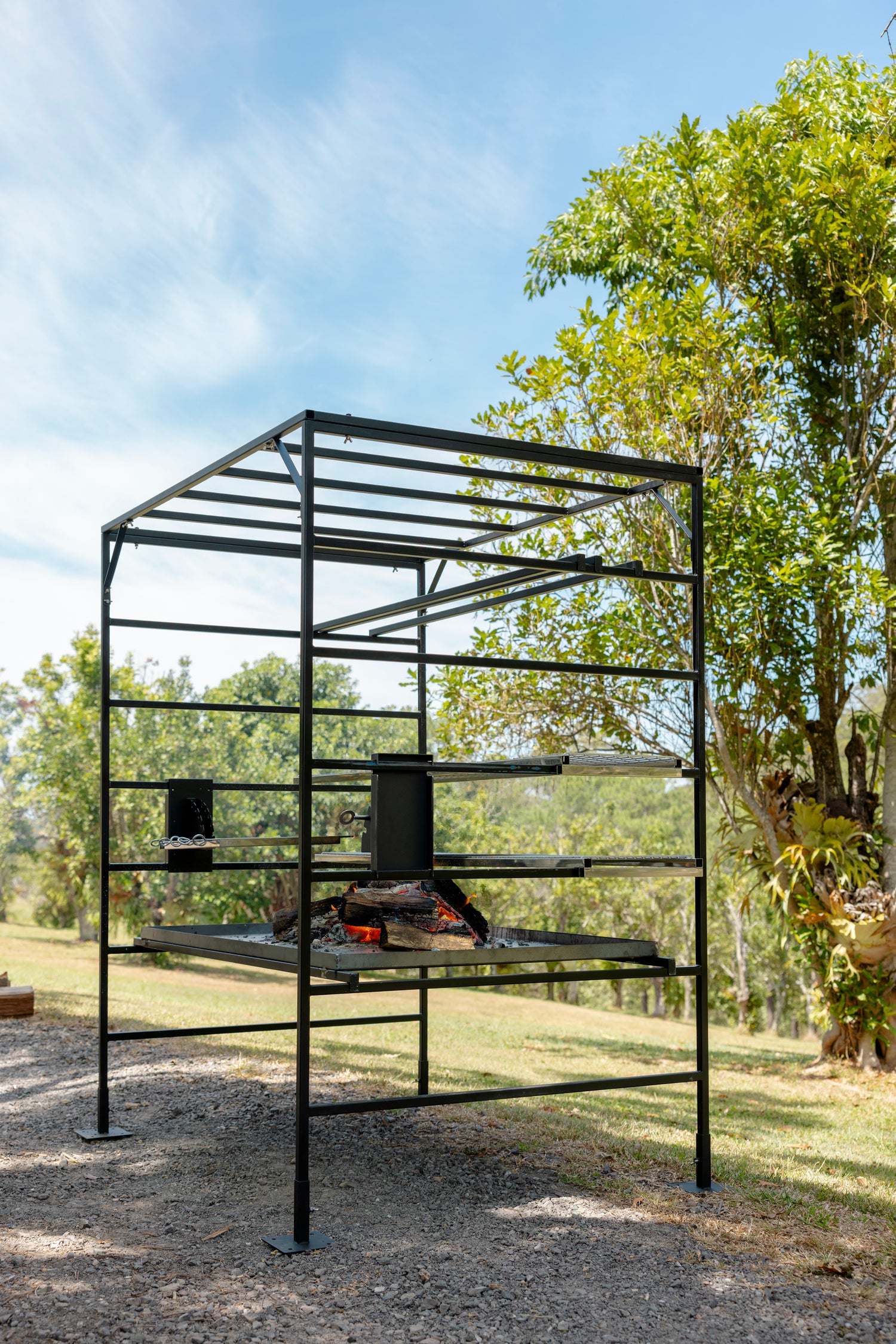 Portico Large wood-fired Asado grill side angle showing premium Australian construction