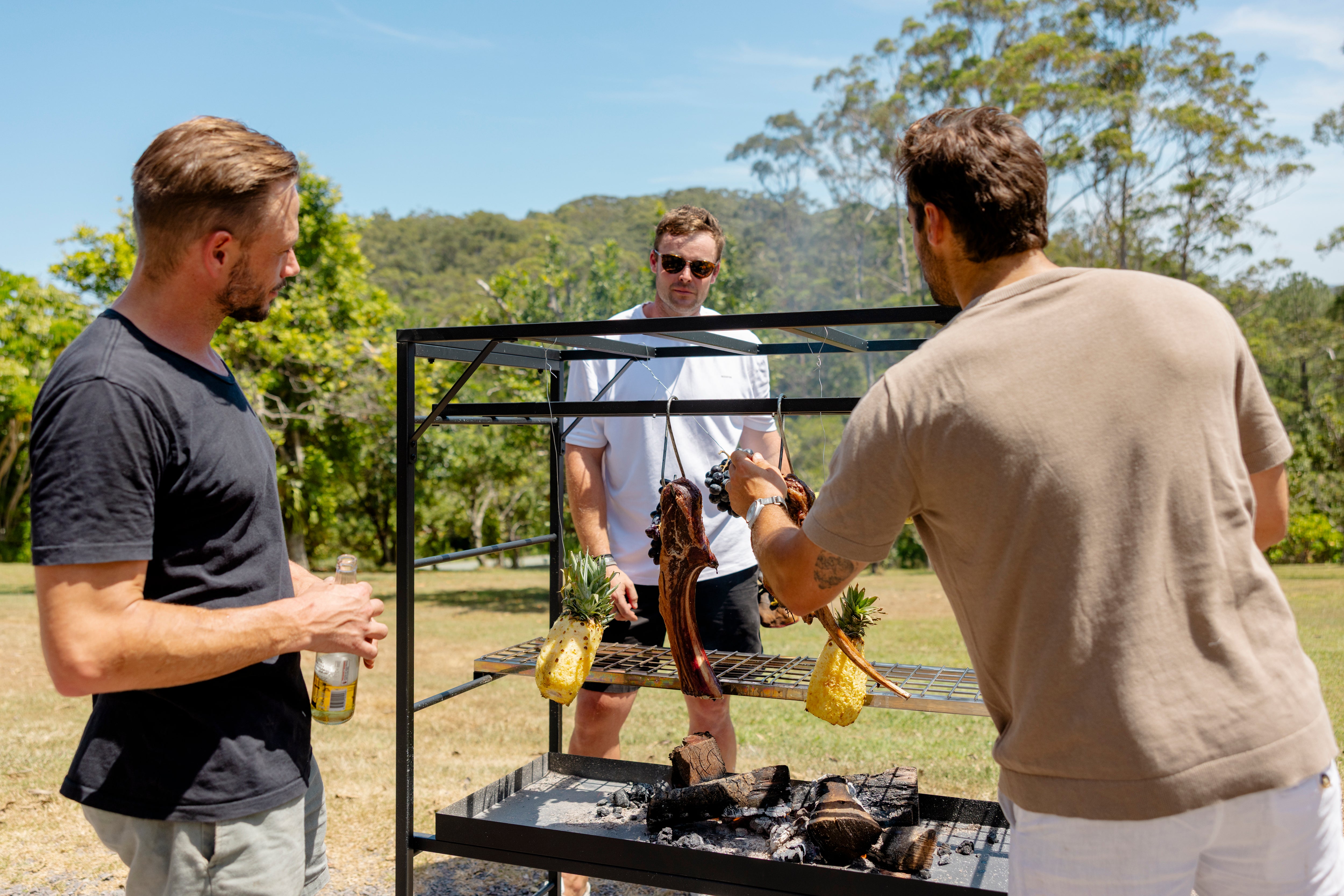 Open-fire food cooking on the Portico Small