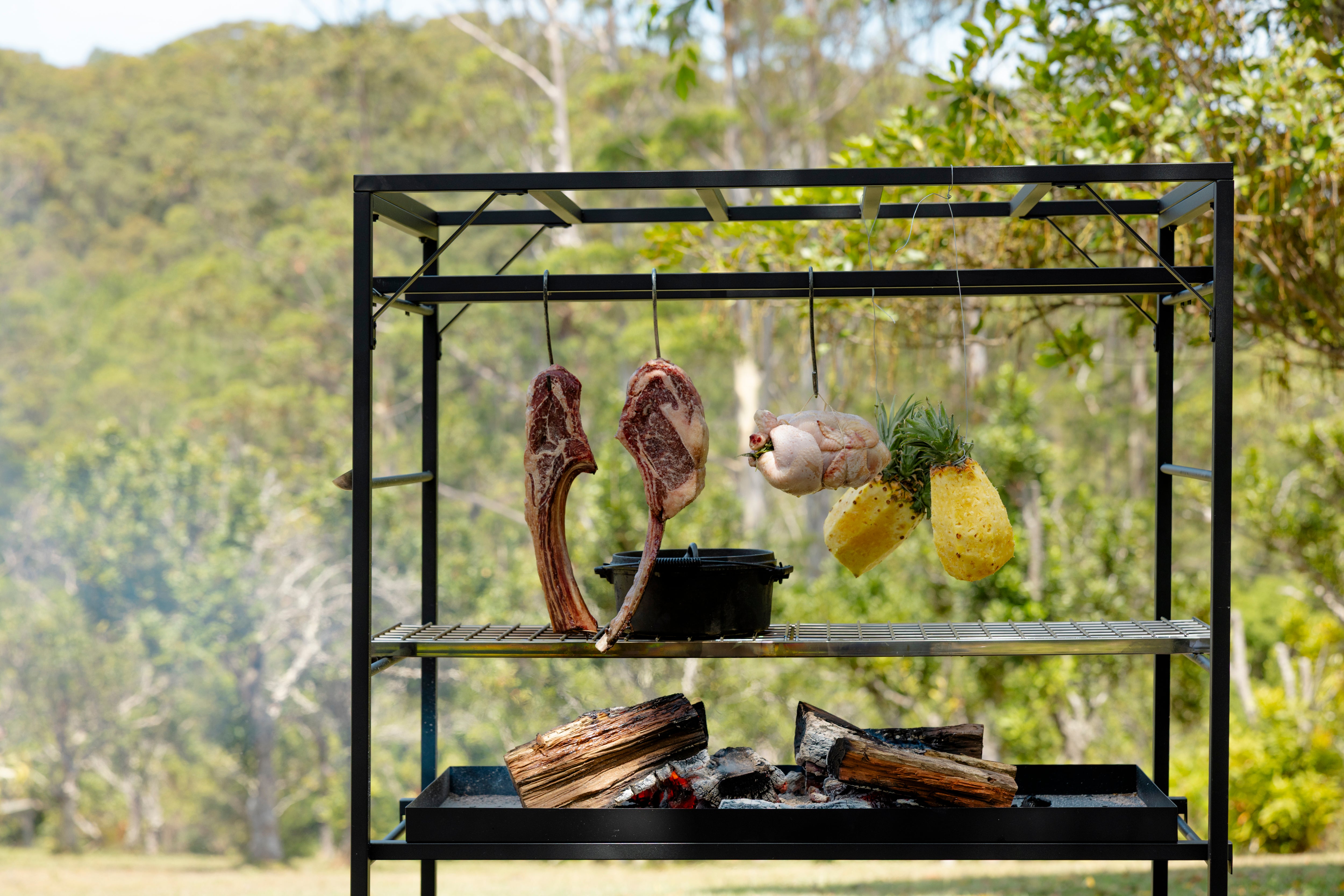 Portico Small open-fire BBQ cooking outdoors